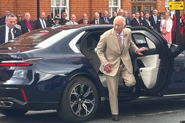 King Charles arriving in BMW 7 Series Prestige Edition